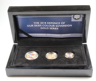 The 2018 Defence of Our Skies colour sovereign gold series comprising sovereign, half sovereign and quarter sovereign, boxed and with certificate 