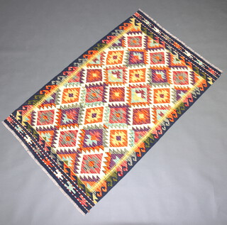 A white, orange and purple ground Chobi Kilim rug with all over diamond design 156cm x 100cm 