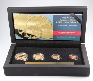A 2021 We Will Remember Them gold sovereign deluxe set comprising sovereign, half sovereign, quarter sovereign and one eighth sovereign, boxed and with certificate 