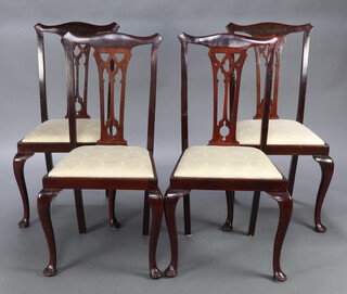 A set of 4 Edwardian Chippendale style mahogany slat back dining chairs with pierced vase shaped slat backs and upholstered drop in seats, raised on cabriole supports 100cm h x 48cm w x 43cm d (seat 27cm x 27cm) 