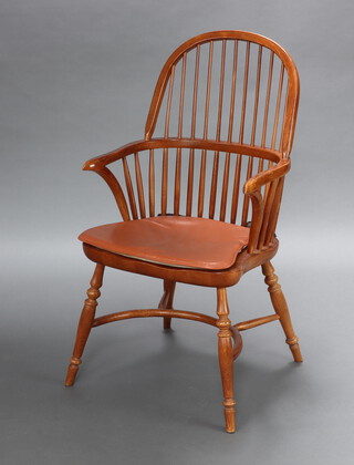 Classic Furniture Group, a 20th Century beech stick back carver chair with solid seat, raised on turned supports with crinoline stretcher 103cm h x 54cm w x 56cm, seat 31cm x 37cm 