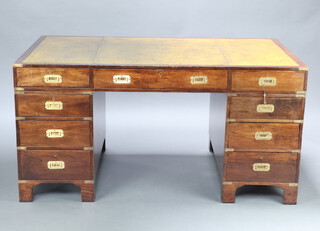 A mahogany military style brass bound desk with green leather inset writing surface 76cm h x 151cm w x 89cm d 