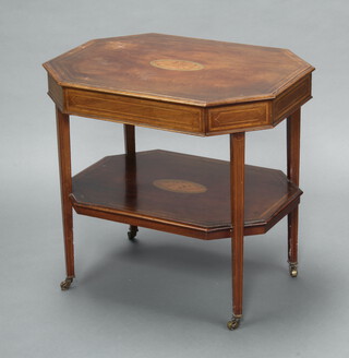 An Edwardian lozenge shaped inlaid mahogany 2 tier occasional table raised on square tapered supports, brass caps and casters 62cm h x 67cm w x 50cm d 