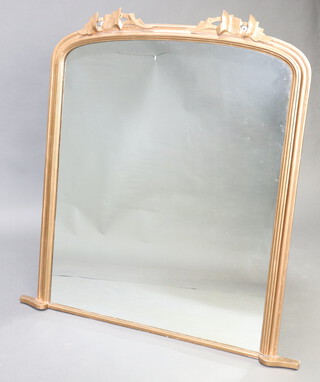 A Victorian arched plate overmantel mirror contained in a gilt frame with vinery decoration 124cm x 106cm x 6cm 
