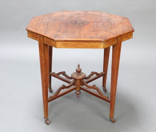 A Victorian octagonal inlaid rosewood occasional table raised on square tapered supports ending in ceramic casters and with X framed stretcher 70cm h x 74cm w x 74cm w 
