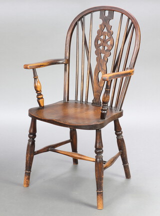 A 19th Century elm Windsor kitchen carver chair raised on turned supports with H framed stretcher 101cm h x 53cm w x 48cm d  (seat 28cm x 30cm)  