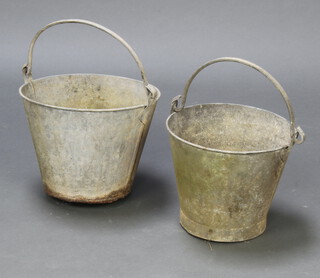 Two circular galvanised buckets 24cm h x 29cm diam. and 20cm x 26cm (1 has a misshapen bottom and some rust) 