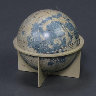 A Lunar globe - "The La Lunar" 17cm x 17cm (small dent) raised on a plastic stand  