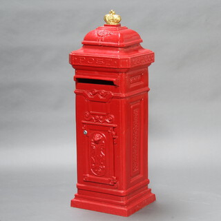 A red painted iron house post box surmounted by a crown 96cm h x 36cm w x 32cm d (complete with keys, being kept in the office) 