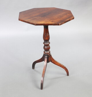 A Victorian octagonal rosewood wine table raised on pillar and tripod base 71cm h x 50cm w x 51cm d 