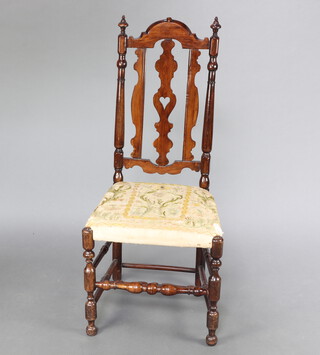 A 17th/18th Century fruitwood hall chair with shaped splat back and needlework seat, raised on turned supports 109cm h x 48cm w x 41cm d 