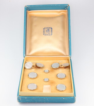 A gentleman's yellow metal 14k cufflink and stud set boxed by Birks 
