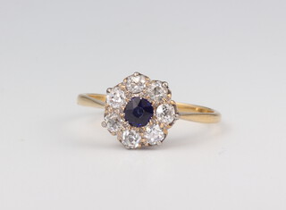 A yellow metal sapphire and diamond cluster ring 3.2 grams, size Q 1/2