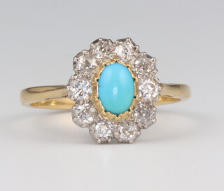 A yellow metal 18ct oval turquoise and diamond cluster ring 3.7 grams, size R 1/2
