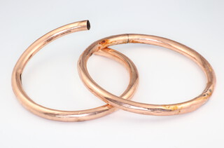 Two 9ct yellow gold hollow bangles, 37.5 grams 