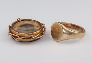 A gentleman's 9ct yellow gold signet ring 5.6 grams, size L together with a 9ct yellow gold fob compass 
