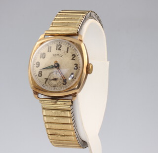 A gentleman's Rotary 9ct yellow gold wristwatch contained in a 35mm case on a gilt expanding bracelet 