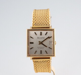 A gentleman's vintage gilt cased Accurist calendar wristwatch on a ditto bracelet, boxed