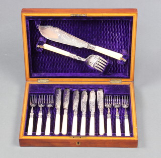 A set of silver plated fish eaters for 6 together with servers in a fitted case 