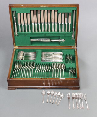 A canteen of silver plated cutlery for 8 (79) contained in a mahogany canteen retailed by Harrods and minor cutlery 