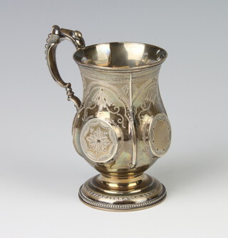 A Victorian panelled silver mug with floral decoration London 1871, 86 grams, 9cm 