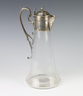 A Victorian silver mounted claret jug of plain form London 1873