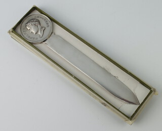 A Christofle silver plated paper knife with a bust of Emperor Napoleon, boxed 