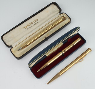 A 9ct yellow gold yard o'led propelling pencil and 2 gilt ditto 