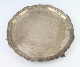 A silver salver with pie crust rim and presentation inscription, Sheffield 1939, 25cm, 530 grams 