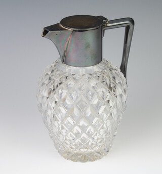 A moulded glass spirit decanter with plated mounts 18cm 