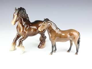 A Beswick brown gloss figure of a cantering horse, no. 975, 22cm modelled by Arthur Gredington together with an Exmoor pony no. 1645, 16.5cm by Arthur Gredington