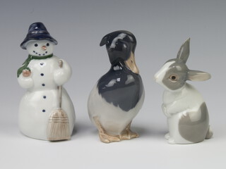 Two Royal Copenhagen figures - duck 1941 12cm and snowman URS658 together with a Nao figure of a seated rabbit 11cm (chip to ear) 