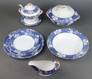 A Copeland Spode Cracked Ice and Prunus pattern 28 piece part dinner service comprising 2 dinner plates (1 with chipped rim), 2 medium plates, 5 tea plates (1 chipped), 10 soup/dessert bowls (1 cracked, 1 chipped in glaze), 2 vegetable tureens and covers (slight pitting), 2 soup tureens with lids (1 bowl chipped), bases and ladles (1 ladle chipped), gravy boat, meat dish, 1 medium serving plate (cracked), 2 small serving plates (slight pitting)  