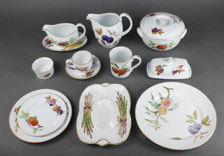 An extensive Royal Worcester Evesham Gold pattern dinner service comprising 2 rectangular casserole dishes, 5 tureens and cover, 4 quiche dishes, twin handled tureen (no lid), 2 circular bowls, twin handled grattan dish, shallow bowl, butter dish and cover, asparagus dish, sauce boat and stand, large jug, cream jug, 2 vinegar bottles, 6 ramekins, 2 small bowls, 7 dinner plates (all with dish washer damage) 5 side plates, 7 tea plates, 6 pudding bowls (1 chipped), 3 breakfast bowls, 2 sugar bowls, 2 bowls, 2 mugs, 9 large tea cups, 4 large saucers, 12 small cups and 12 saucers,        