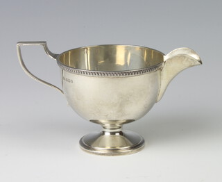 A silver pedestal cream jug Sheffield 1933 124 grams 