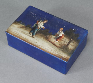 Balkan Sobranie, a rectangular lacquered cigarette box the lid decorated a couple in a snowy landscape 5cm x 17cm x 11cm 