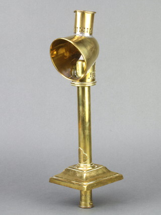 A Barrett & Sons, a candle reading lamp with deflector, raised on a square base 34cm h x 11cm w x 10cm d 