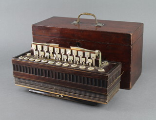 A 19th Century accordion with 22 buttons, complete with carrying case 