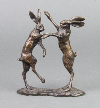 A bronze figure group of 2 boxing hares, base indistinctly signed 11cm x 10cm x 3cm 