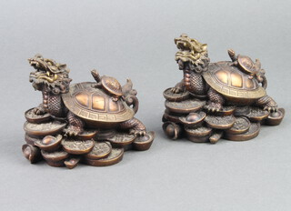 A pair of Chinese bronze figures of tortoise dragons 10cm 