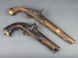 A 19th Century percussion pistol with 18cm barrel and ram rod together with a flintlock pistol with 27cm barrel