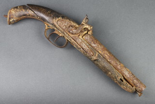 A Spanish double barrelled percussion Howdah pistol, the top of the barrel marked C Santos Elbar, with wooden grip 