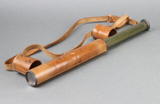 A military issue 2 drawer brass and leather telescope with broad arrow marked M908 S.3. 