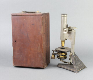Beck, an iron and polished steel student's single pillar microscope marked 14658, contained in a wooden box labelled Star Microscope