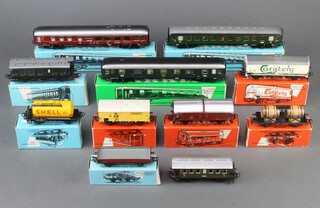 Three Marklin HO gauge carriages nos. 4022, 4024 and 4044 boxed, together with 7 items of Marklin rolling stock - 4500, 4502, 4504, 4509, 4510, 4619 and 4636 together with an unboxed carriage 
