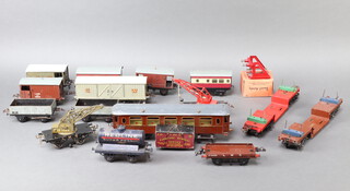 A quantity of various Hornby O gauge rolling stock and a quantity of rails 