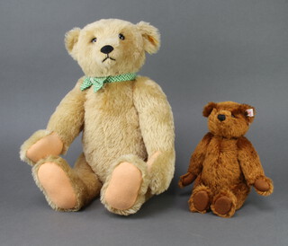 A Steiff yellow mohair teddy bear with hump back and long nose, articulated limbs and growler 53cm together with a brown Steiff bear with articulated limbs 26cm  