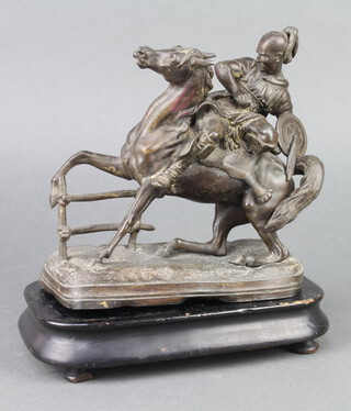 A spelter figure of a classical mounted warrior 19cm x 18cm x 9cm, (base is misshapen) 