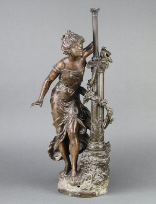 A spelter figure of a standing girl by a lamp post with bird (f) 58cm x 16cm 