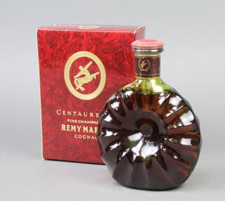 A 70cl bottle of 1980's Remy Martin Centaure X.O. Fine Champagne Cognac 40% vol, boxed